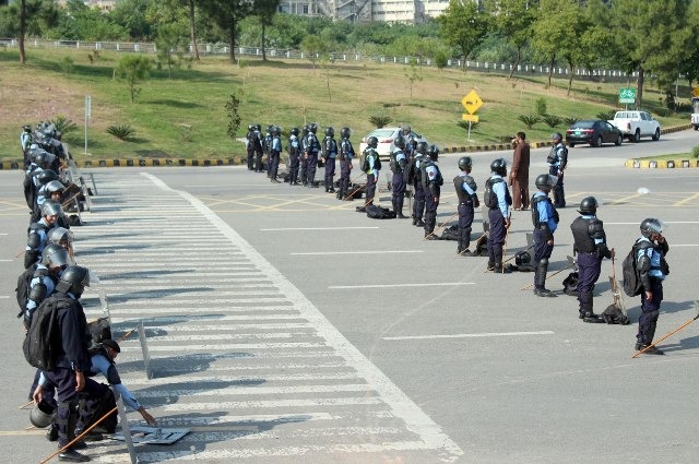 Azadi March Police Official slits his own throat