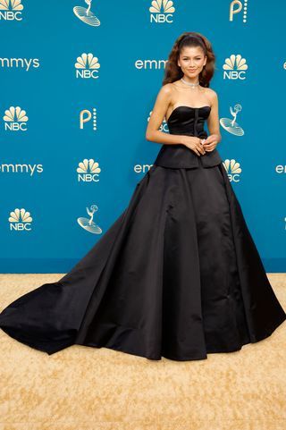 Image may contain Zendaya Clothing Apparel Dress Fashion Human Person Evening Dress Gown and Robe