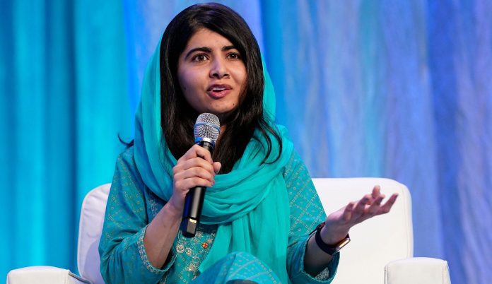 Malala says she will protest if someone forces her to remove her scarf