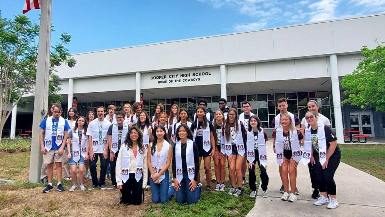14 sets of twins and one set of triplets graduate from same high school