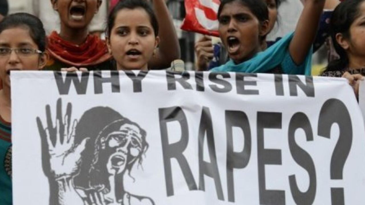 Bystanders watch and film woman get raped on footpath in India