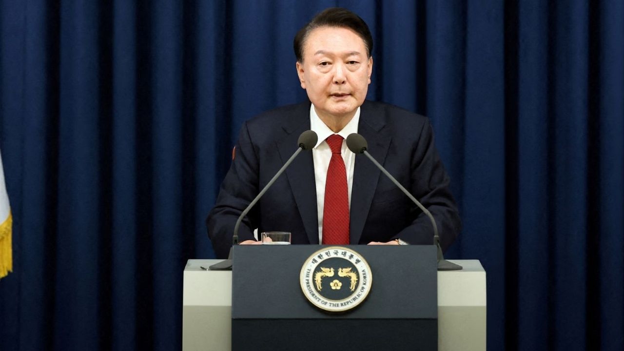 South Korean president pressed to step down over martial law bid