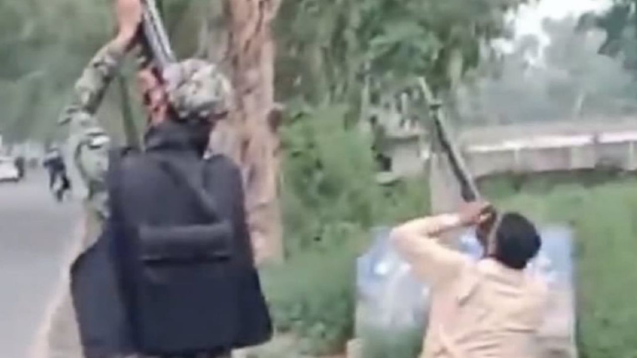 Who is the young man seen in the iconic photo shooting down a drone?