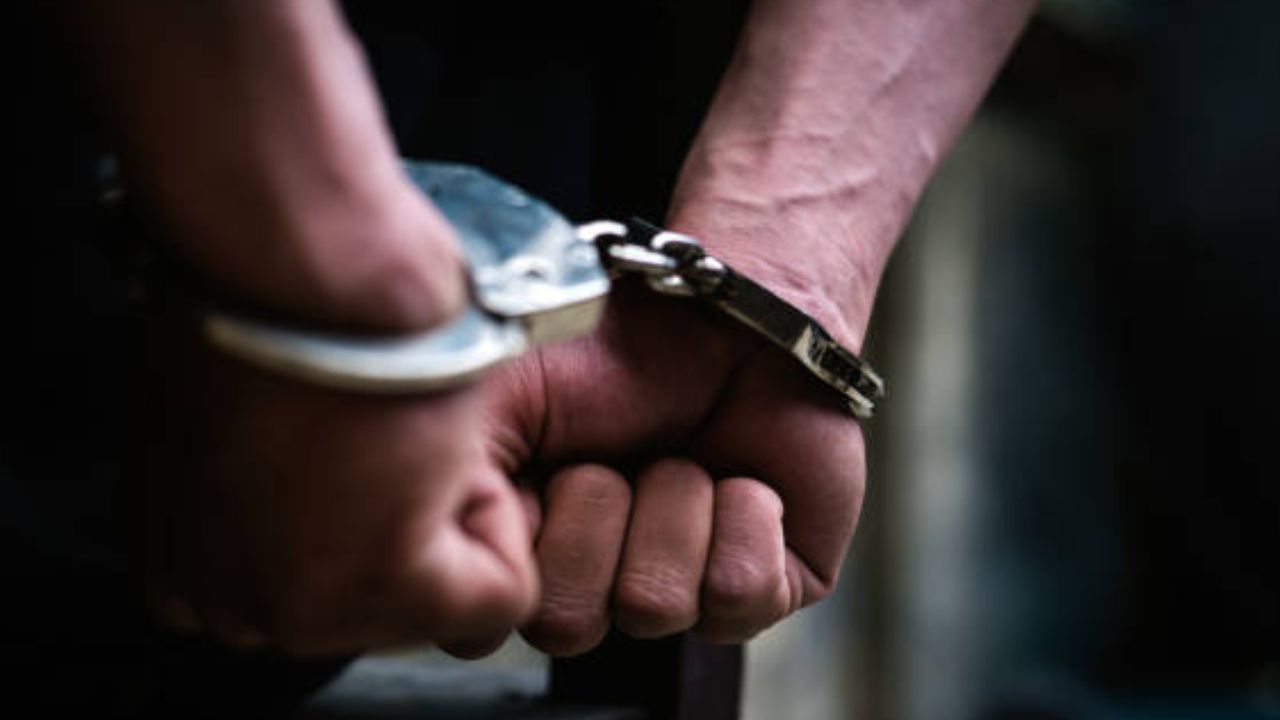 Handcuffed victims found after kidnappers crash runaway car into canal